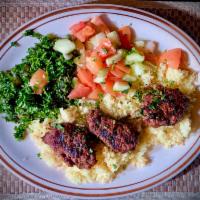 2. Kofta Kabob · Mix of ground lamb and beef with onion, parsley and special seasoning. Served with rice.