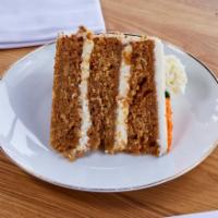 Carrot Cake · This irresistible cake consists of 3 layers of moist carrot cake baked with walnuts, freshly...