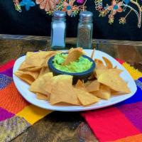 Guacamole Dip & Chips · Fresh guacamole and corn tortilla chips.