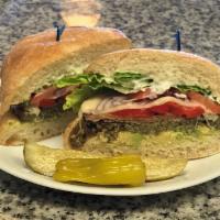 Mediterranean Garden Burger · Eggplant, roasted bell pepper, Swiss cheese, and the works.