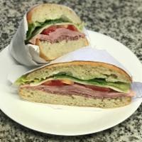 Italian Special Sandwich · Ham, salami, garlic spread, roasted bell pepper, provolone cheese, red onion, tomato, and le...