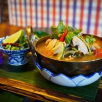 Tom-Yum Chicken · Vegetarian version available. Laotian spicy sour soup, bone-in free range chicken, mushroom.