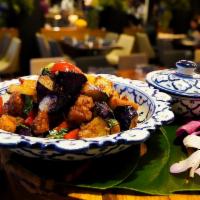Spicy Eggplant · Served with wok fried purple eggplant, chilli garlic, tofu, bell pepper and hot basil with o...