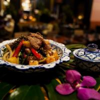 Pad Pha Beef · Served with wok fried hanger steak, chili garlic, green peppercorns, kaffir lime leaves, hol...