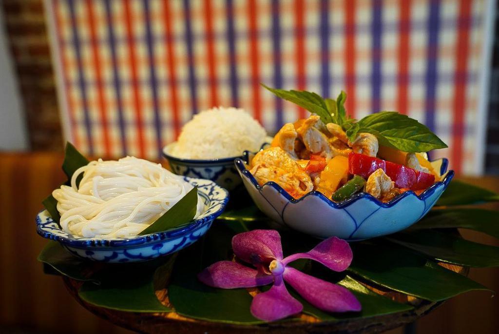 Red Curry Chicken · Coconut milk curry, fresh chicken, apple eggplants and hot basil.  Served with jasmine rice.