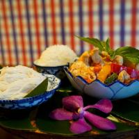 Red Curry Vegetarian · Coconut milk curry, apple eggplants and hot basil. Served with jasmine rice.