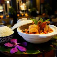 Totally Prawns · Coconut milk red curry, fresh tiger prawns, pineapple and lychee with toasted peanut. Served...