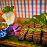 Suae Hong Hai · Snake river farms kobe style beef grilled to perfection and jaow chill with sticky rice. Cry...