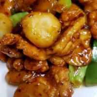 General Tso’s Chicken · Hot and spicy. Lightly breaded chicken with snow peas, sweet peppers, and water chestnuts.


