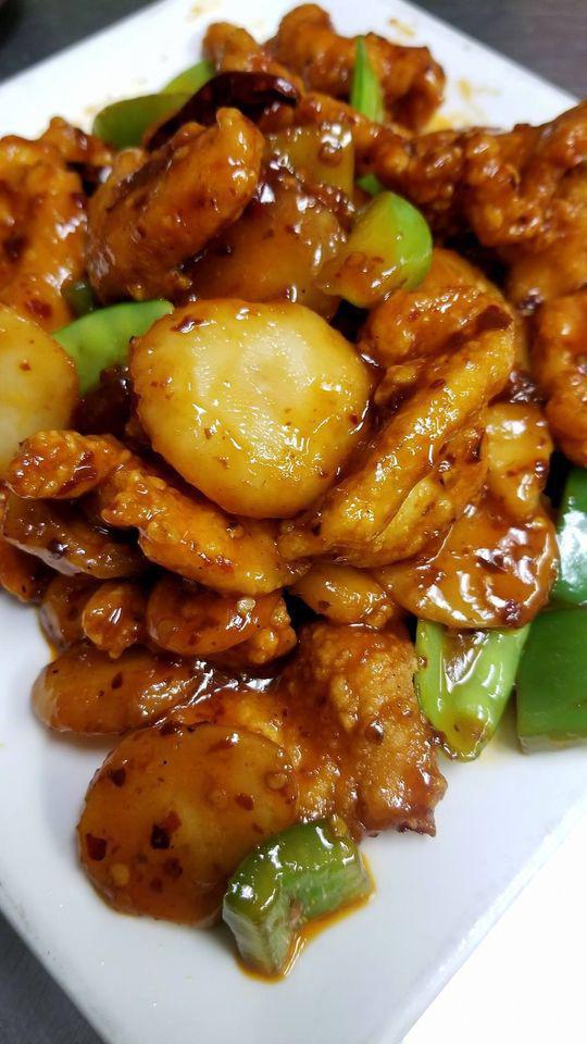 General Tso’s Chicken · Hot and spicy. Lightly breaded chicken with snow peas, sweet peppers, and water chestnuts.

