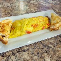 Philly Omelette · Shaved steak, American cheese, peppers and onions.