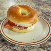 Wake-n-Bacon Bagel Sandwich · Served with bacon, tomato cream cheese.