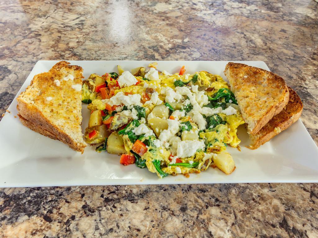 Greek Sandwich · Served with egg, spinach, feta, red peppers.