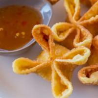 Crab Cheese Wonton · 6 pieces. Crispy wonton flowers stuffed with the mixture of crab and cheese served with home...