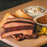 Half Back · 6 St. Louis Style ribs with your choice of 2 sides. Includes Texas toast, pickles, peppers, ...