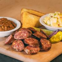 Jalapeño Cheddar Hot Link Dinner · Includes 2 Sides, Pickle, Pepper, Onion, Texas toast and BBQ Sauce