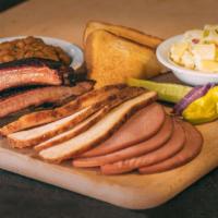 3 Meat Combo Dinner · Includes 3/4 pound of meat, 2 sides, pickle, pepper, onion and Texas toast.