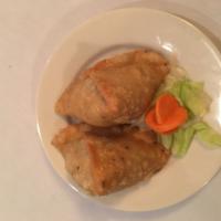 Keema Samosa · Crispy turnovers with seasoned ground beef and green peas. Served with versatile Indian home...