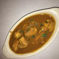 Chicken Curry · Boneless chicken breast cooked in onions, garlic, ginger and spices. 
