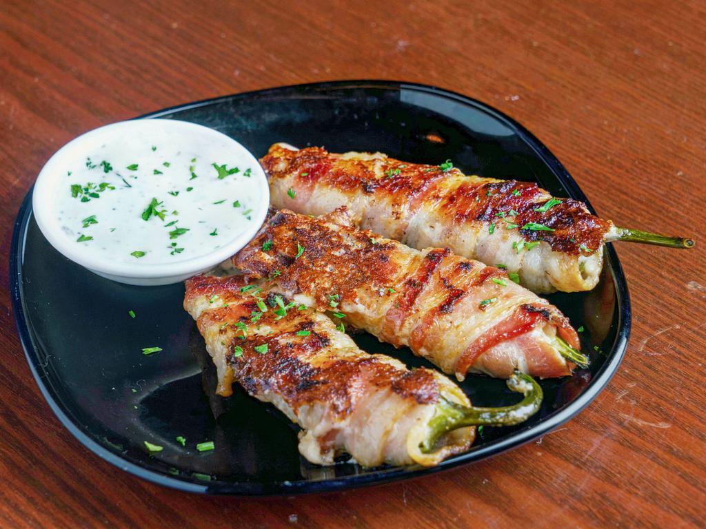Jalapeno Bacon Wrapped Poppers · served with ranch.