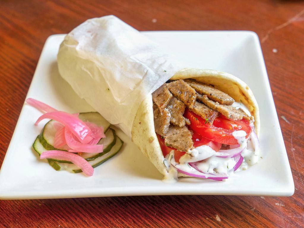 Gyros Sandwich · beef & lamb meat, tzatziki sauce, tomato & red onion on pita bread.