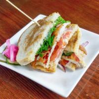Like A Club · grilled chicken, bacon, Swiss cheese, garlic aioli, tomato, red onion & spinach on sourdough...