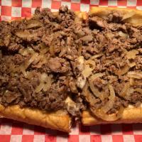 4. Extra Meat and Extra Cheese Cheesesteak · Extra meat and extra cheese with sauteed onions.