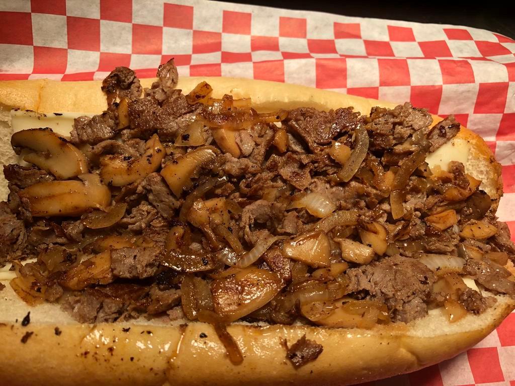 8. Mushroom Cheesesteak Combo · Steak, sauteed onions, mushrooms and cheese. Comes with regular fries and choice of drink.