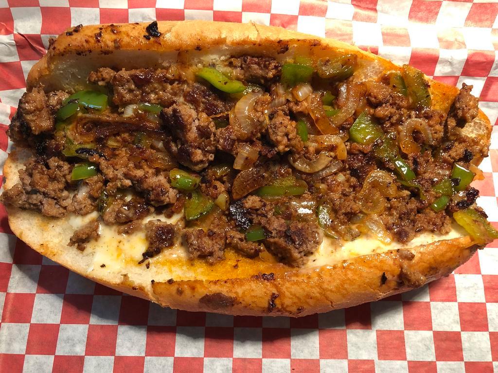 13. Overbrook Cheesesteak · Chopped ground beef, bell peppers, sauteed onions, cheese and Tony's sauce.
