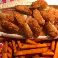 23. Shrimp Po-Boy Sandwich Combo · Fried Shrimp, lettuce, tomato and chipotle mayonnaise. Comes with regular fries and choice o...