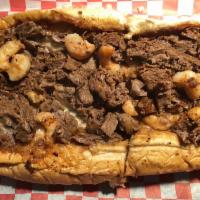 25. Steak and Shrimp Cheesesteak · Steak or chicken, regular or spicy shrimp, sauteed onions and cheese.