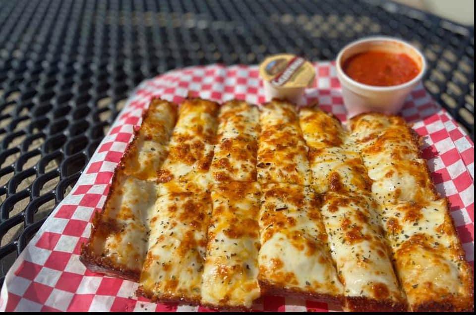 Crazy Bread  · Our homemade cheesy garlic crazy bread. It's so good, it might just change your life. 
