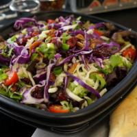 Vernon Hills Chopped Salad · Mixed greens, romaine lettuce, bacon, chicken, red cabbage, cherry tomatoes, onions, cucumbe...