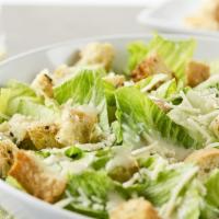 Caesar Salad · Crisp lettuce, crunchy homemade croutons, Parmesan cheese and served with Caesar dressing.
