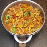 3. Vegetable Jalfrezi · Stir fried assorted vegetables cooked with bell peppers, sliced onions and cilantro in a tan...