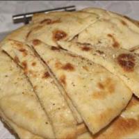 7. Roghni Naan · A special tandoori bread stuffed with sesame seeds.