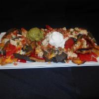 Emmett's Nachos · Pico de gallo, gucamole, and sour cream. Add beef or chicken for an additional charge.