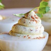 Truffle Deviled Eggs · Paprika-cayenne pepper and greens. Gluten free.