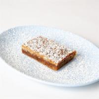 G-BAR · House made ginger snap crust melted with a dense coconut caramel.