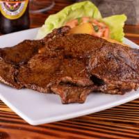 Parrilla Personal · Tender steak marinated in our special parrilla sauce and cooked on a charcoal grill with you...