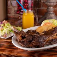 Churrasco ( Chuck Steak ) · Tender chuck steak marinated in our special parrilla sauce and cooked on the grill with your...