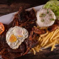 Churrasco A Lo Pobre ( Chuck Steak) · Tender grilled chuck steak accompanied with french fries, 2 sunny side eggs, sweet plantains...