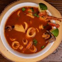 Parihuela · A traditional Peruvian delight with fish chunks, mussels, squids, shrimps, calamari and crab...