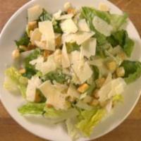 Caesar Salad · Romaine lettuce, croutons, Parmesan cheese tossed in our creamy Caesar dressing.