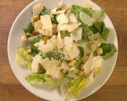 Caesar Salad · Romaine lettuce, croutons, Parmesan cheese tossed in our creamy Caesar dressing.