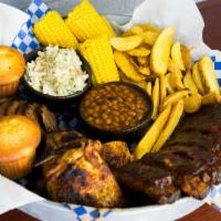 Feast for Two · Generous helpings of St. Louis-Style Spareribs, Country-Roasted Chicken, Texas Beef Brisket,...