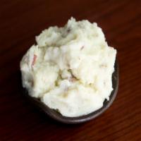 Garlic Red-Skin Mashed Potatoes · Red-skin potatoes mixed with milk, butter and garlic.