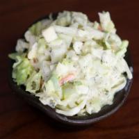 Creamy Coleslaw · A zesty slaw that's pineapple sweet with a hint of horseradish.