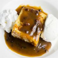 Dave's Award-Winning Bread Pudding · Melt-in-your-mouth, scratch-made bread pudding. Served with pecan praline sauce, vanilla ice...