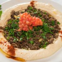 Hummus with Beef · Hummus topped with ground beef and toasted nuts.
